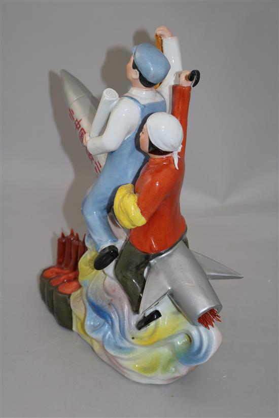 A mid/late 20th century Chinese propaganda polychrome ceramic group, 14.5in.